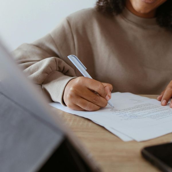 Lady proofreads a document